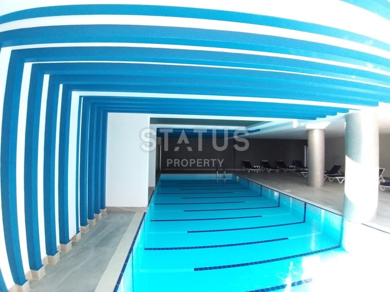 Апартаменты 2+1 на первой береговой линии с видом на горы и море в Махмутларе! 95 кв. м. фото 18