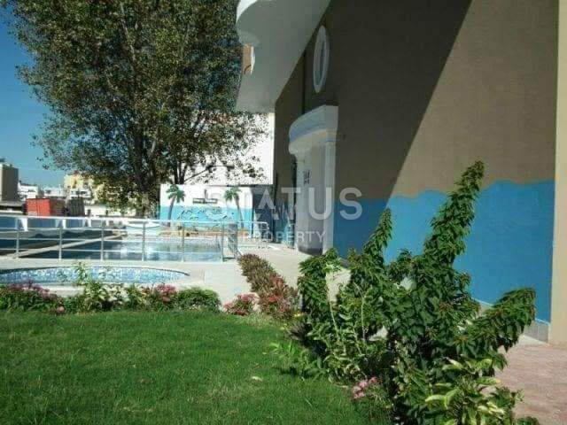 Недорогая квартира в Махмутларе с мебелью и техникой 65 кв.м. фото 1