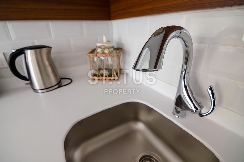 Элитный проект в самом центре города Алании с отельной инфраструктурой фото 38