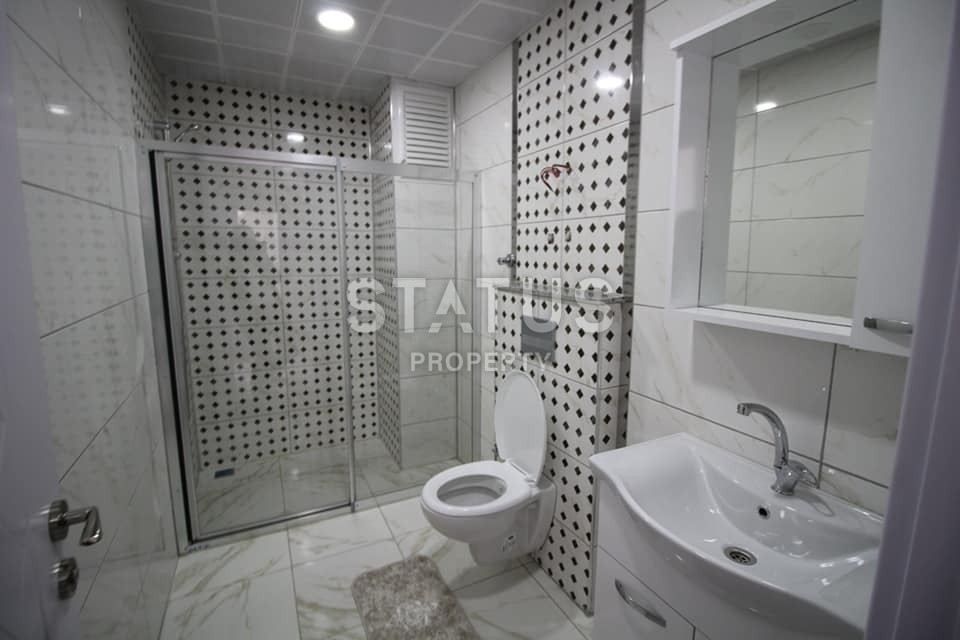 Новая трехкомнатная квартира с мебелью в Махмутларе, 100 м2 фото 14