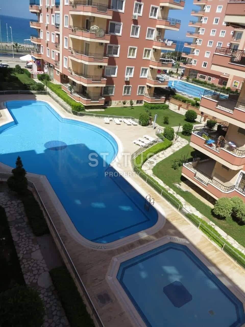 Квартира 2+1 в Махмутларе на первой линии с боковым видом на море фото 4