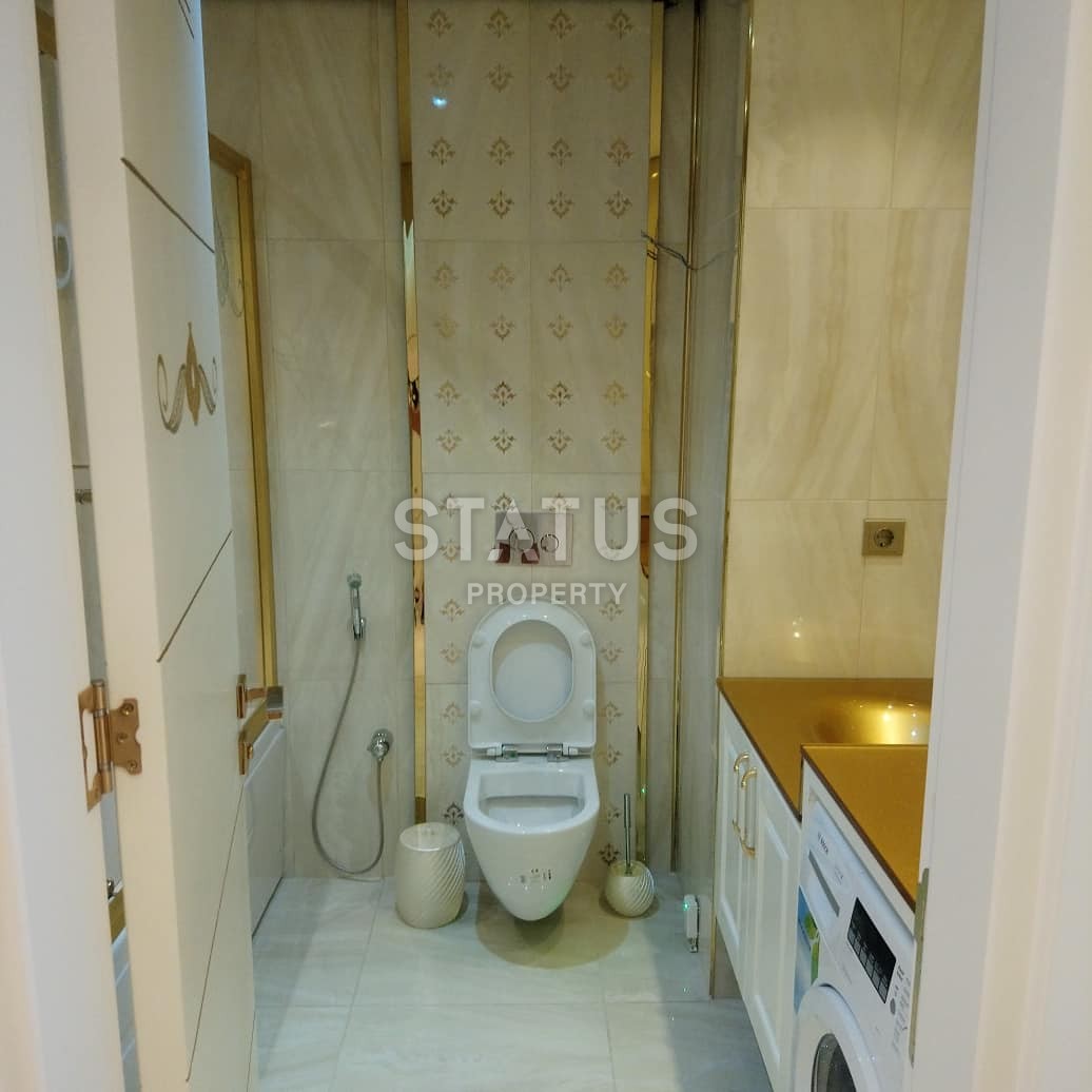 Шикарные трехкомнатные апартаменты на первой береговой линии в районе Махмутлар фото 14