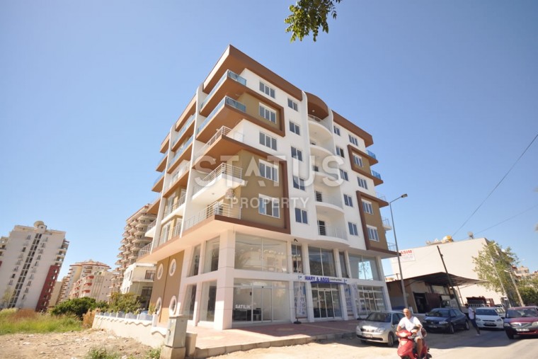 Квартира в Махмутларе недорого в доме с бассейном 60 кв.м. фото 1