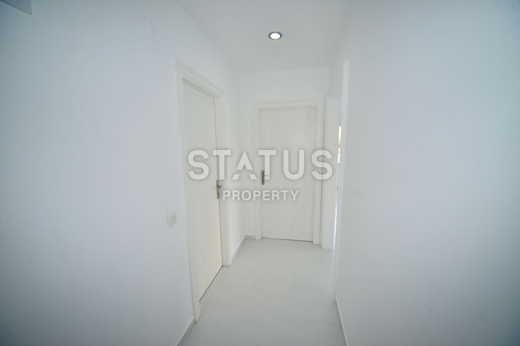 Квартира в Махмутларе недорого в доме с бассейном 60 кв.м. фото 2