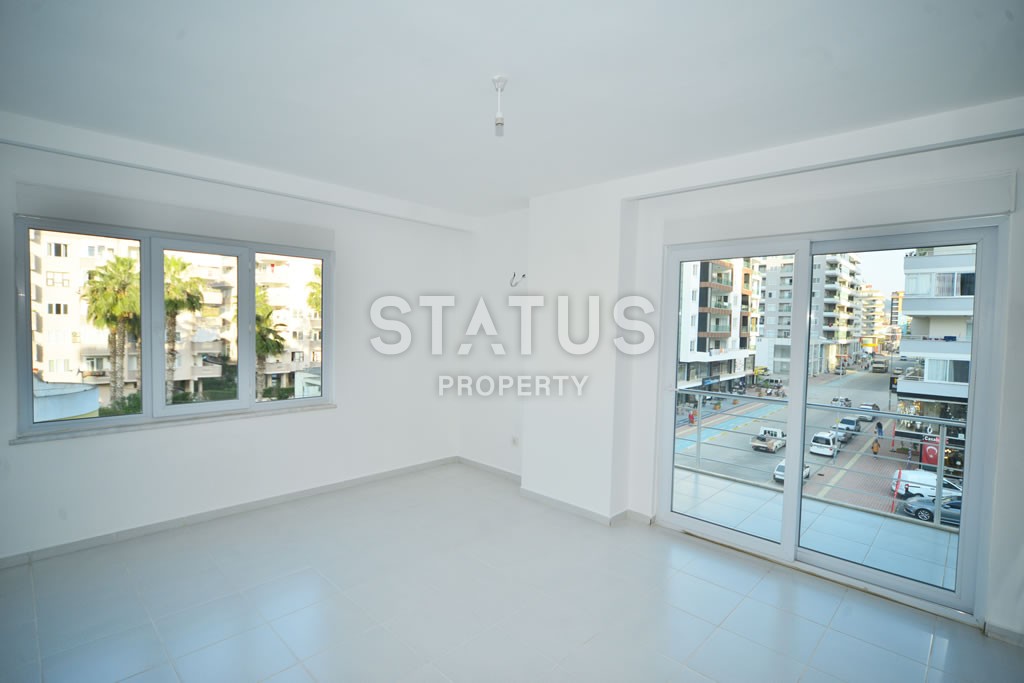 Квартира в Махмутларе недорого в доме с бассейном 60 кв.м. фото 11