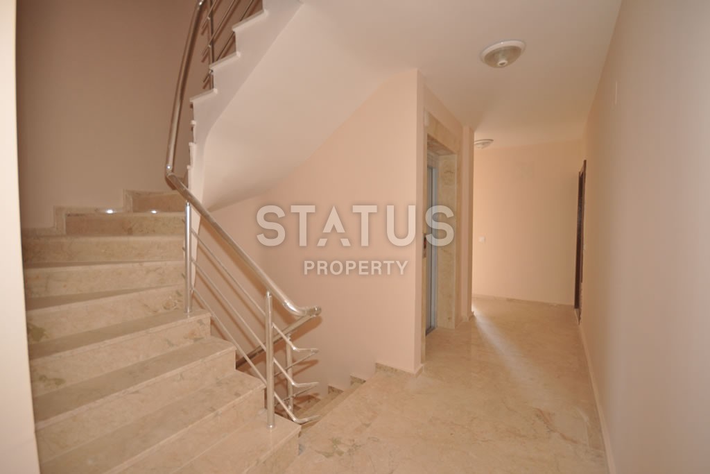 Квартира в Махмутларе недорого в доме с бассейном 60 кв.м. фото 16