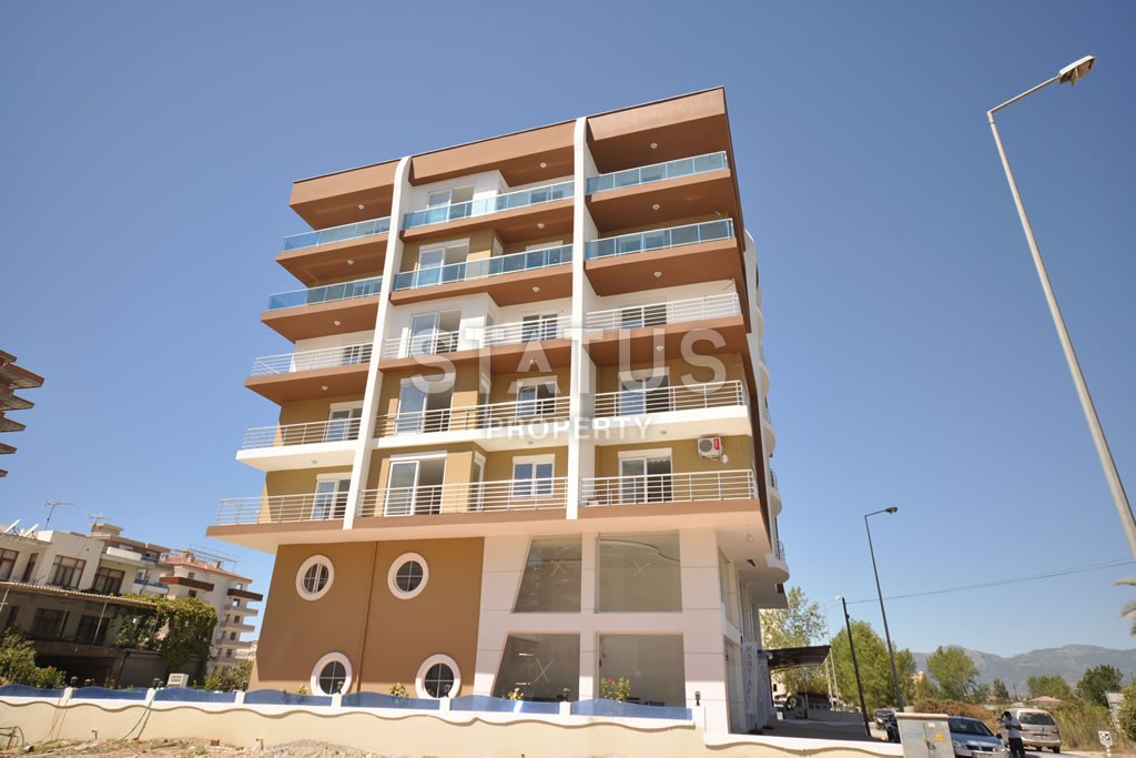 Квартира в Махмутларе недорого в доме с бассейном 60 кв.м. фото 17