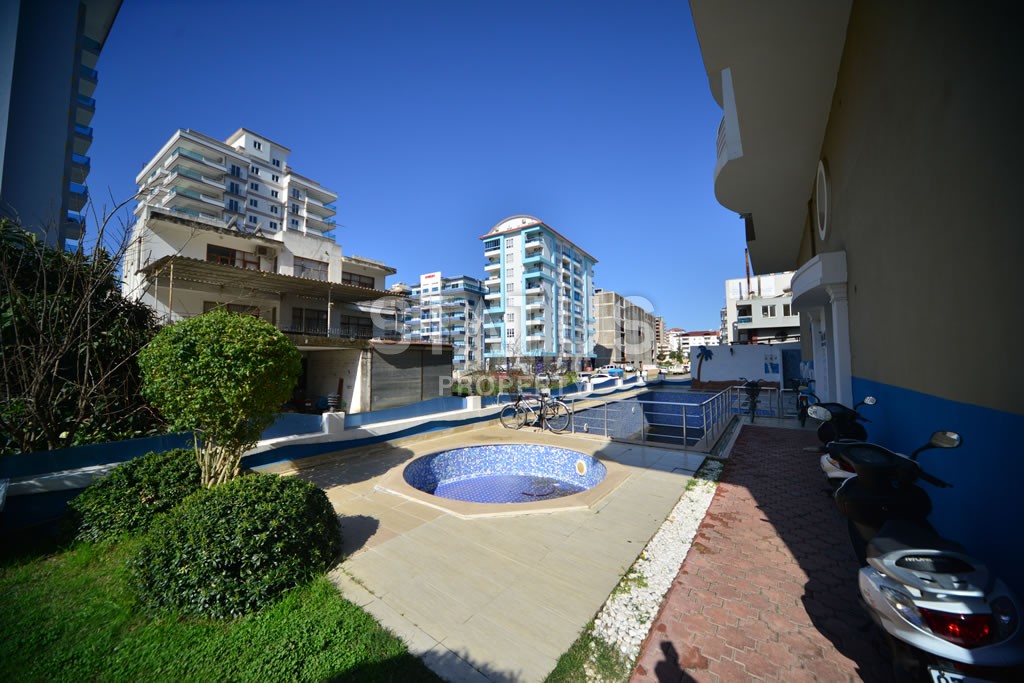 Квартира в Махмутларе недорого в доме с бассейном 60 кв.м. фото 21