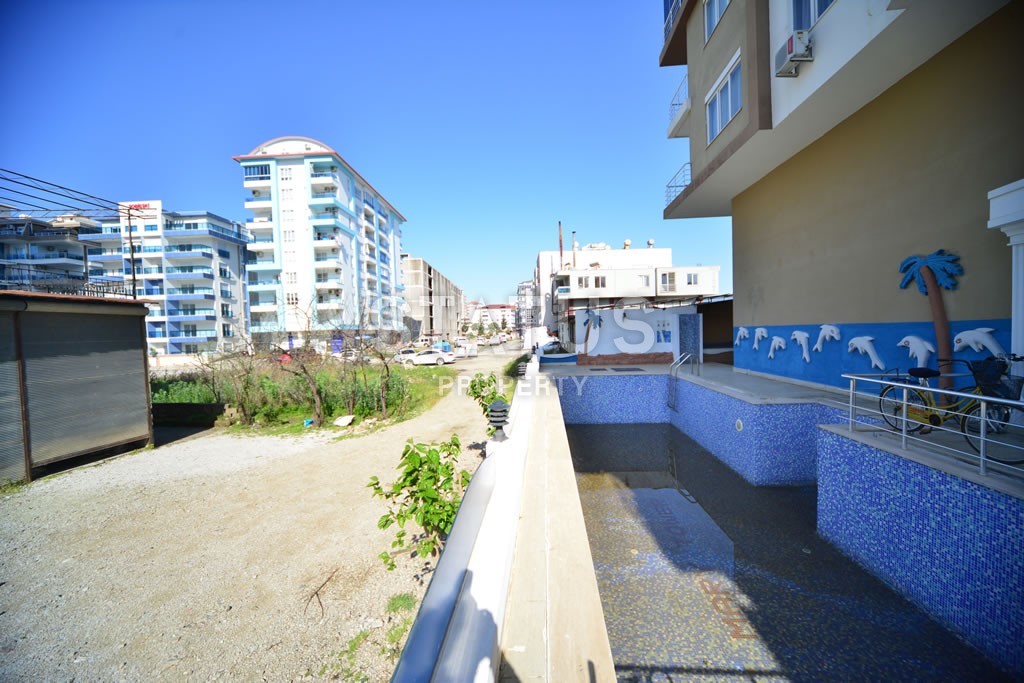 Квартира в Махмутларе недорого в доме с бассейном 60 кв.м. фото 22