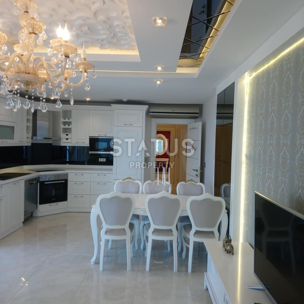 Шикарные трехкомнатные апартаменты на первой береговой линии в районе Махмутлар фото 39