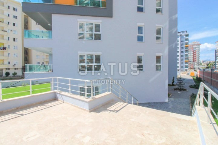 Просторная двухкомнатная квартира от собственника районе Махмутлар по хорошей цене фото 6