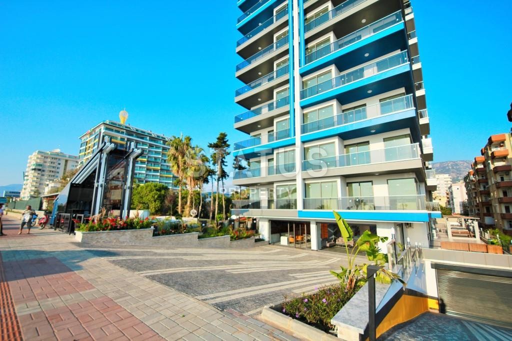 Светлая трехкомнатные апартаменты на первой береговой линии в районе Махмутлар фото 2