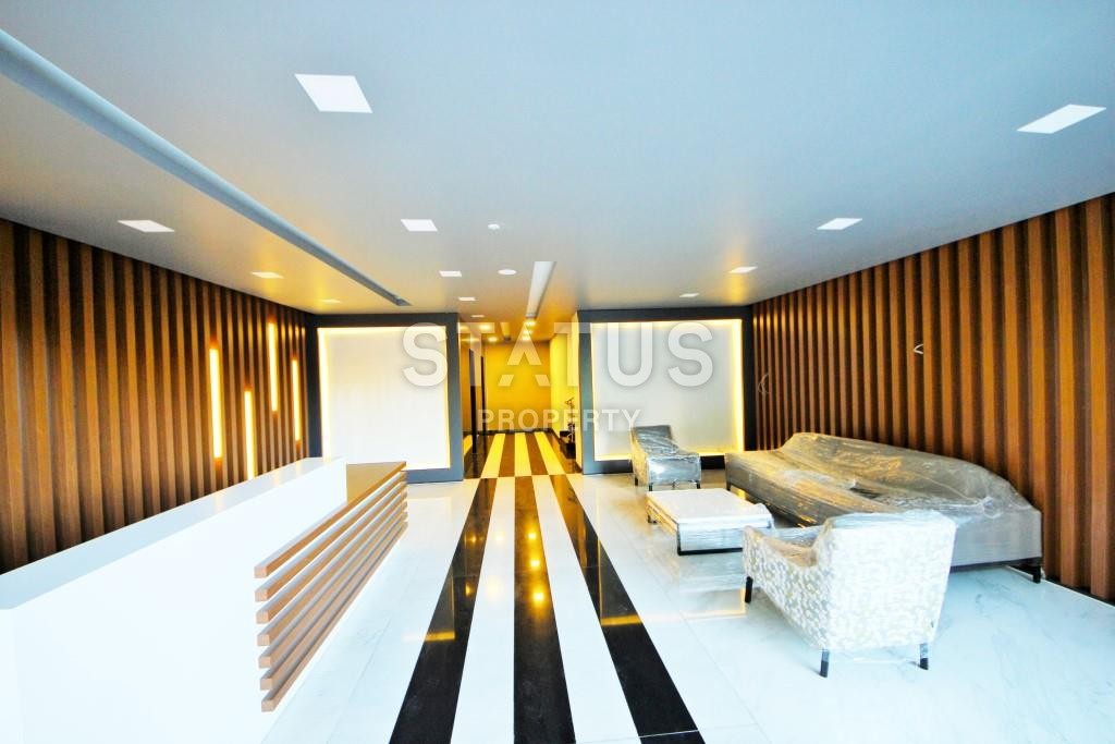 Светлая трехкомнатные апартаменты на первой береговой линии в районе Махмутлар фото 5