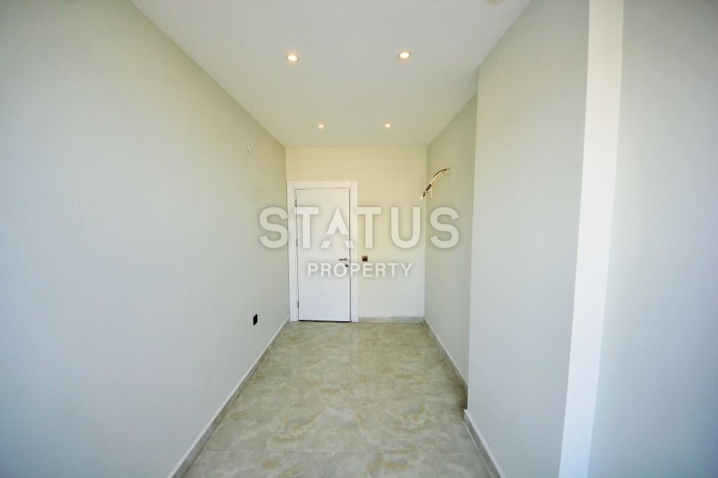 Светлая трехкомнатные апартаменты на первой береговой линии в районе Махмутлар фото 8