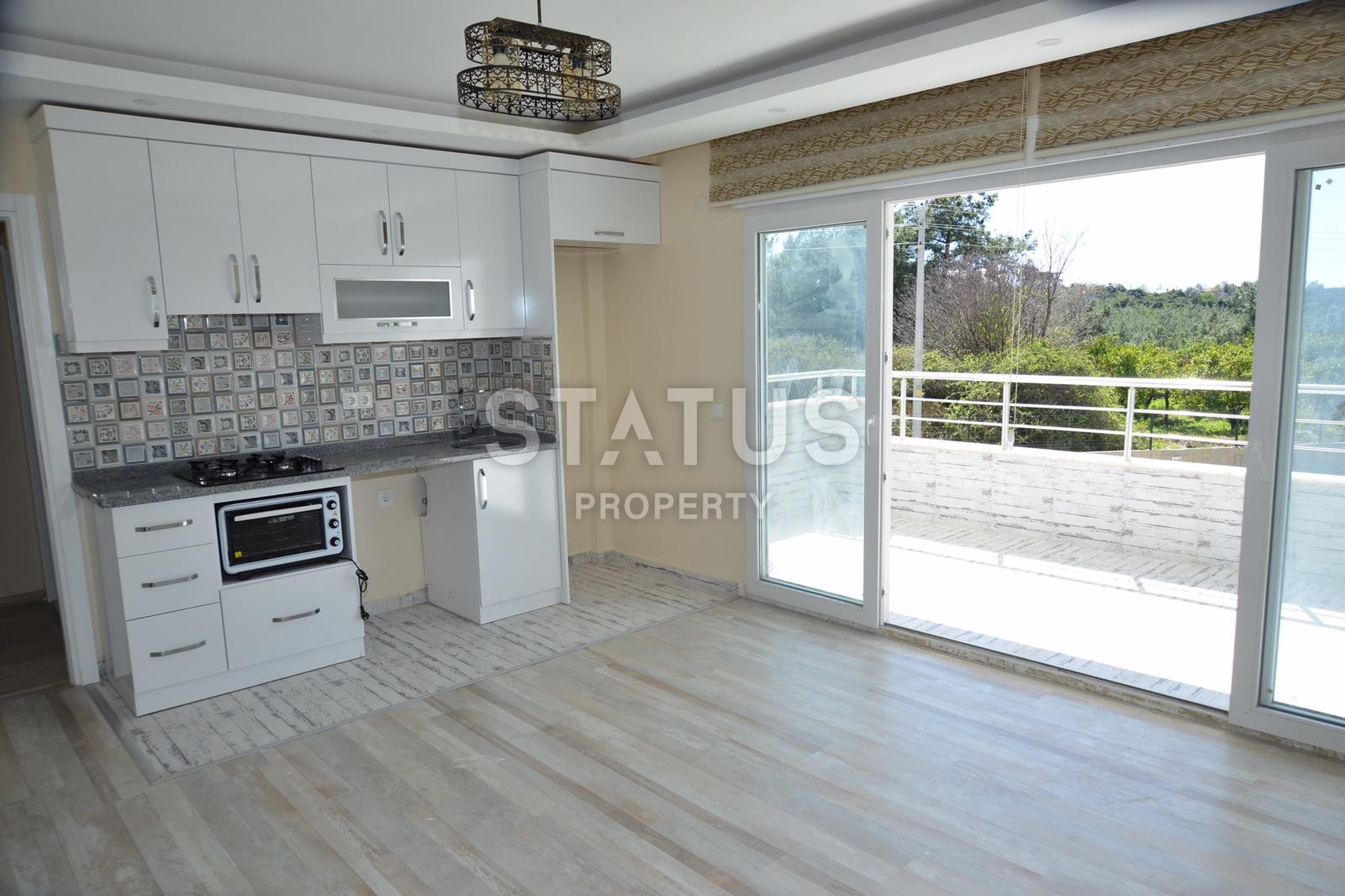 Трехкомнатная квартира с видом на море и горы в Обе фото 9