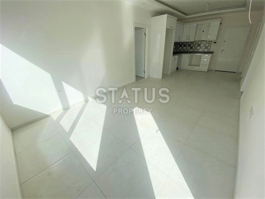 Новая трехкомнатная квартира в Махмутларе, 100 м2 фото 4