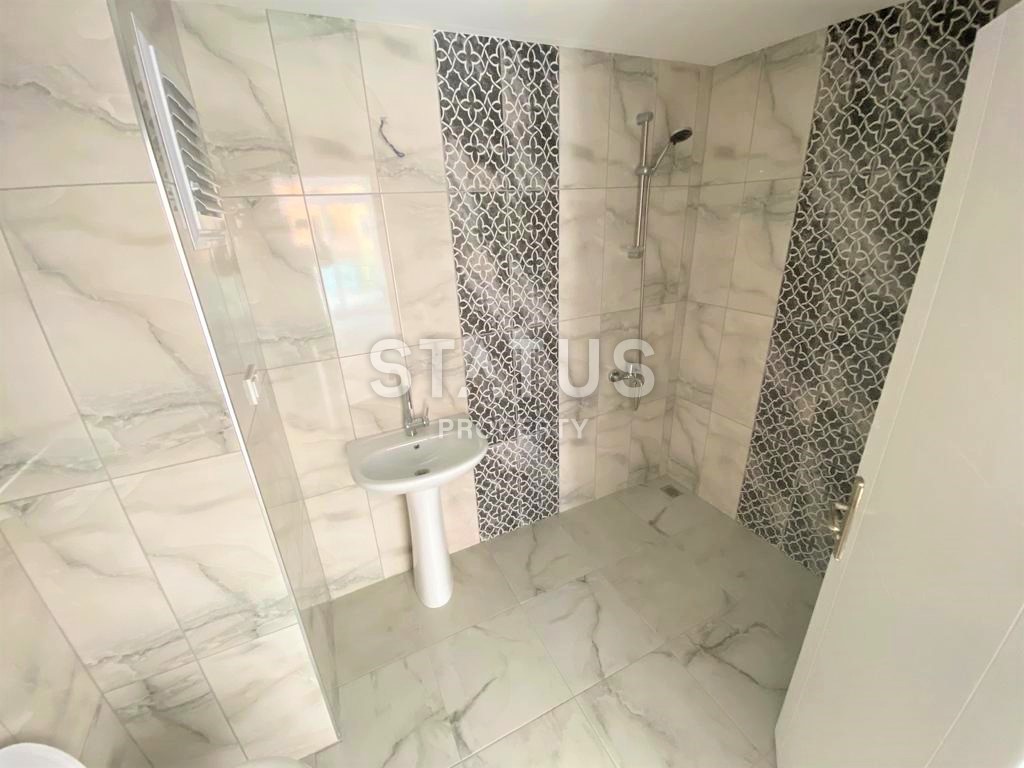 Новая трехкомнатная квартира в Махмутларе, 100 м2 фото 12