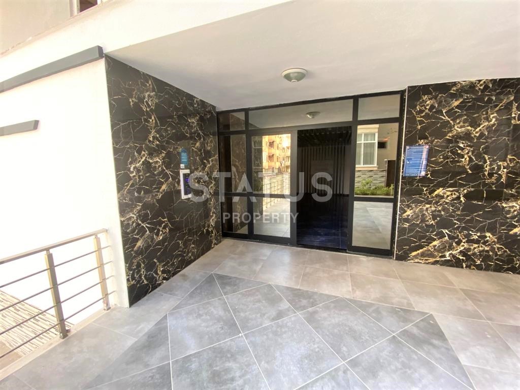 Новая трехкомнатная квартира в Махмутларе, 100 м2 фото 14