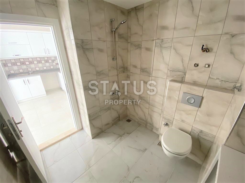 Новая трехкомнатная квартира в Махмутларе, 100 м2 фото 17