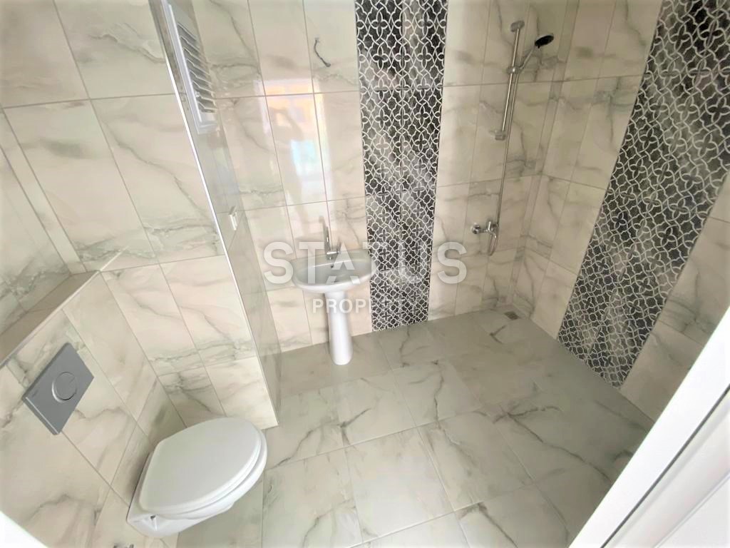 Новая трехкомнатная квартира в Махмутларе, 100 м2 фото 34