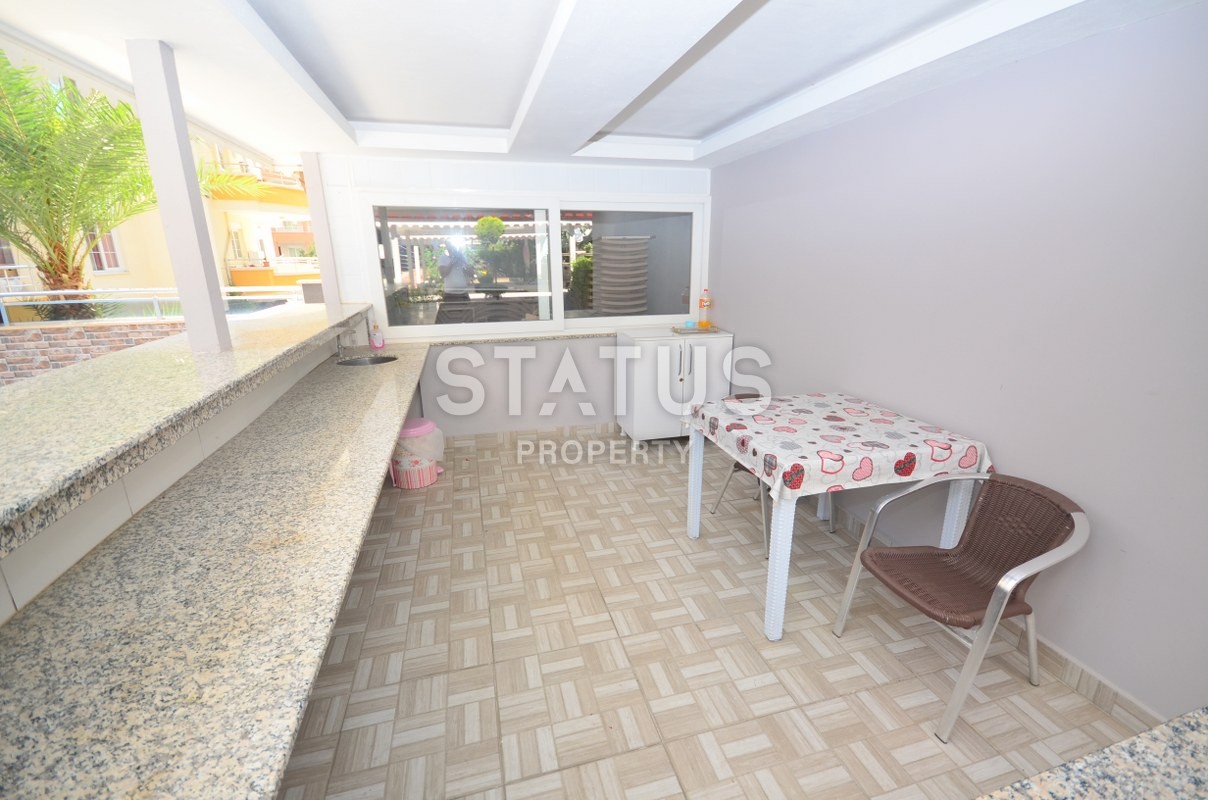 Меблированная двухкомнатная квартира в Махмутларе, 60 м2 фото 13