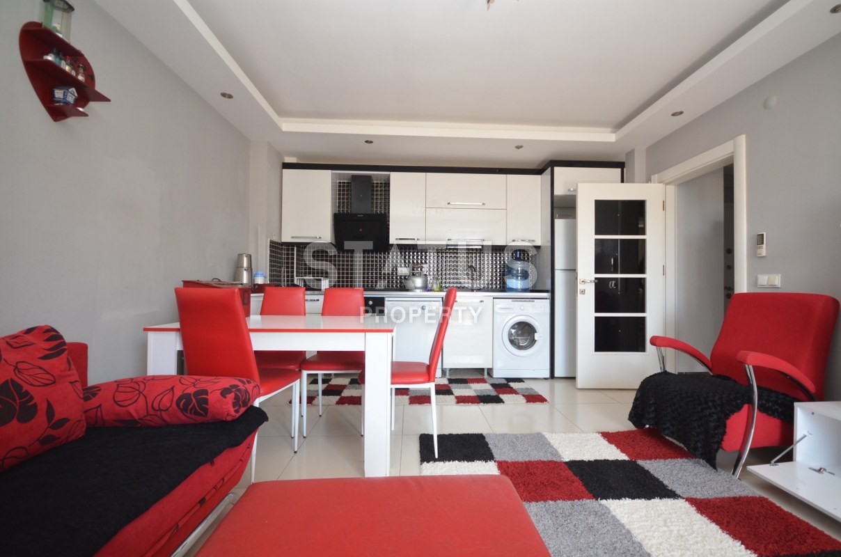 Меблированная двухкомнатная квартира в Махмутларе, 60 м2 фото 17