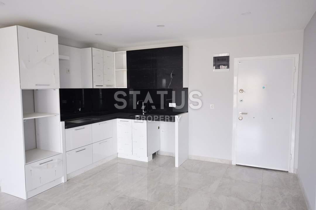 Новая двухкомнатная квартира в Махмутларе, 70 м2 фото 4