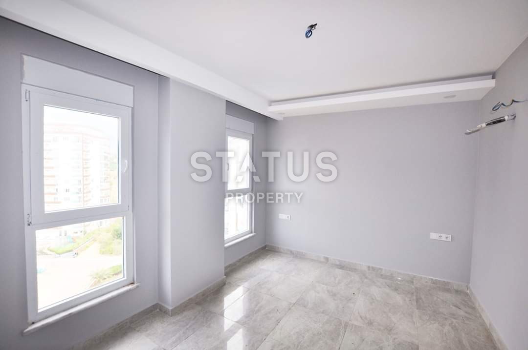 Новая двухкомнатная квартира в Махмутларе, 70 м2 фото 8