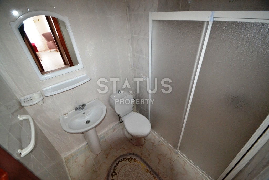 Недорогая трехкомнатная квартира в нескольких минутах от Средиземного моря в районе Махмутлар! фото 13