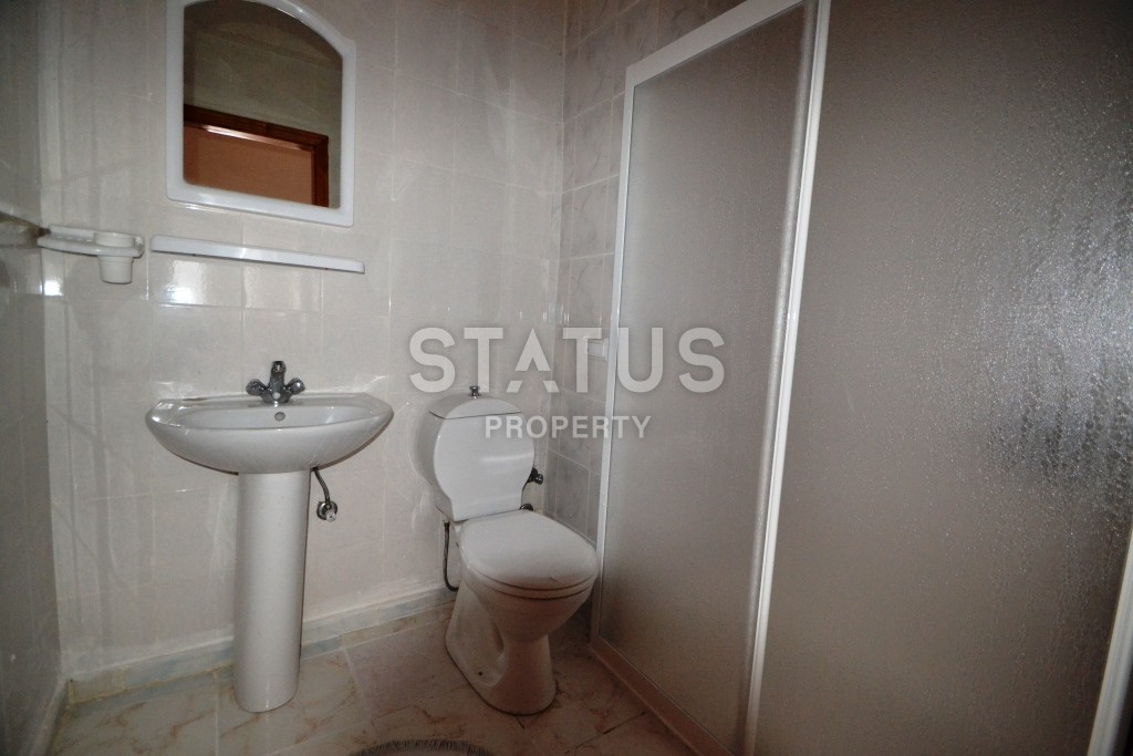 Недорогая трехкомнатная квартира в нескольких минутах от Средиземного моря в районе Махмутлар! фото 14