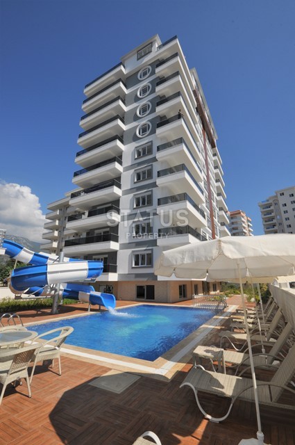 Замечательные двухуровневые апартаменты в нескольких минутах от моря в районе Махмутлар фото 3