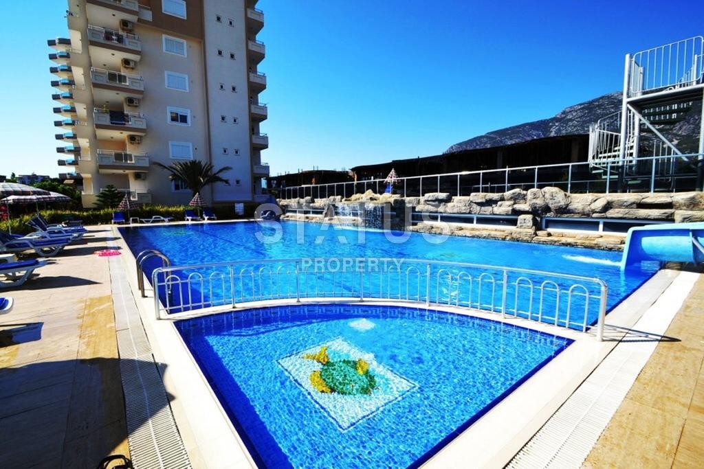 Трехкомнатная квартира в районе Махмутлар, 100 м2 фото 1