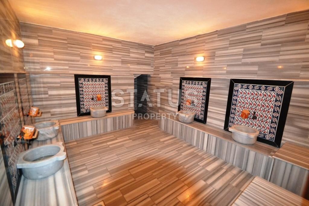 Трехкомнатная квартира в районе Махмутлар, 100 м2 фото 9