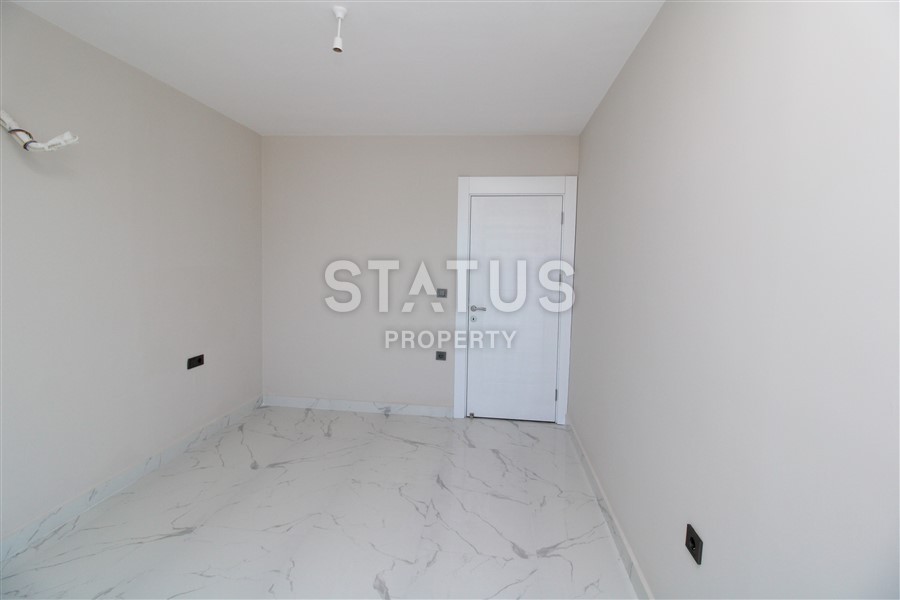 Apartment 1+1 in a new complex in the center of Mahmutlar фото 12