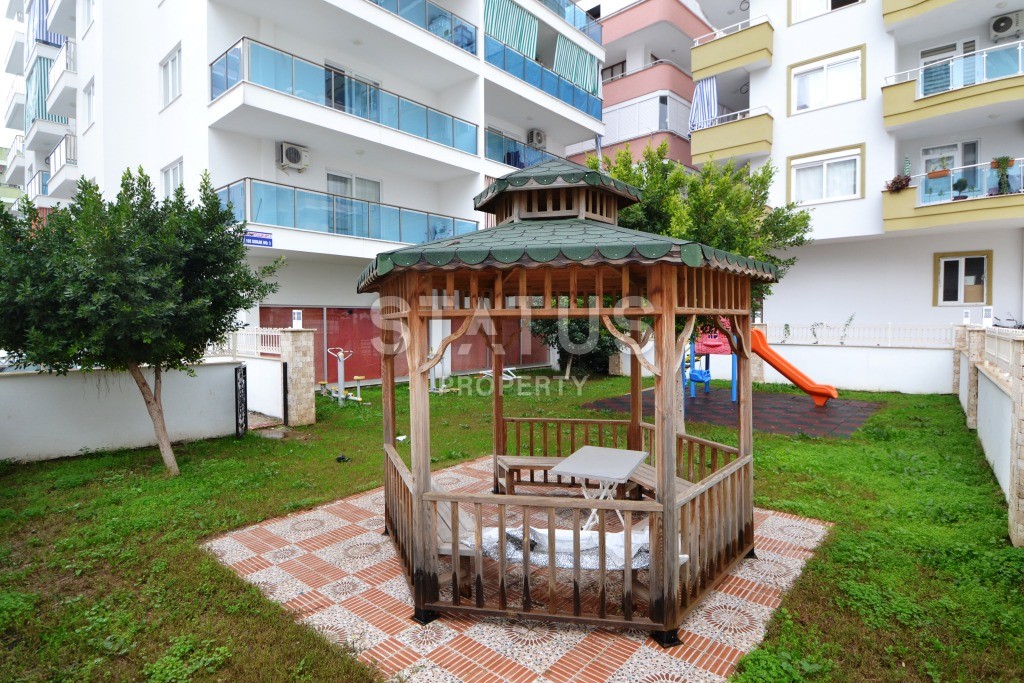 Меблированные трехкомнатные апартаменты в центре района Махмутлар фото 17