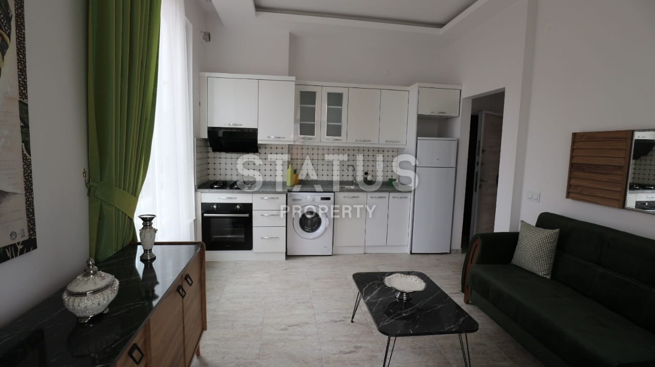 Двухкомнатная квартира с мебелью в новом комплексе. Махмутлар. фото 3