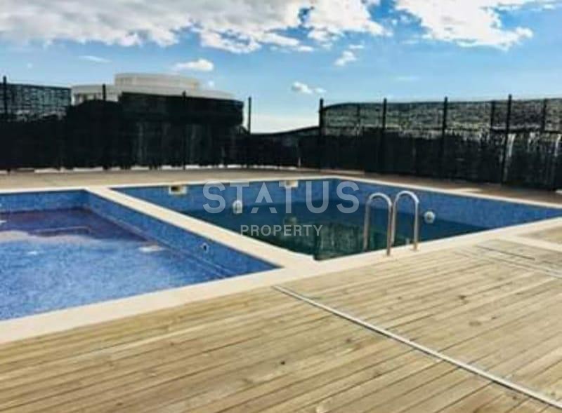 Двухкомнатная квартира в районе Махмутлар фото 4