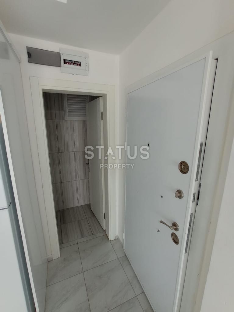 Двухкомнатная квартира в районе Махмутлар фото 10