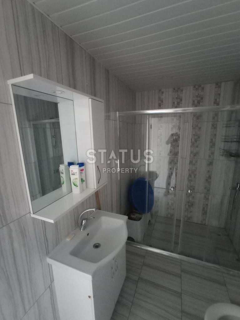 Двухкомнатная квартира в районе Махмутлар фото 11