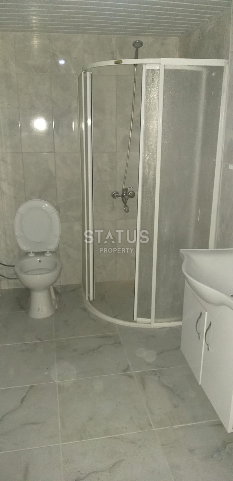 Недорогая двухкомнатная квартира в Махмутларе фото 7