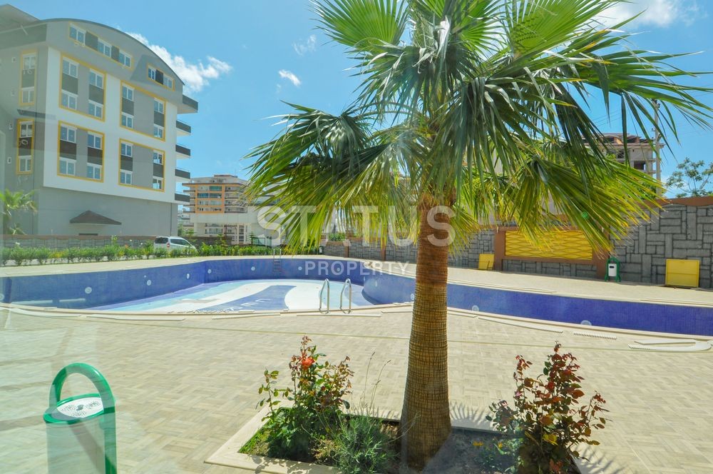 Просторные апартаменты 1+1 в отличном комплексе в Махмутларе фото 17