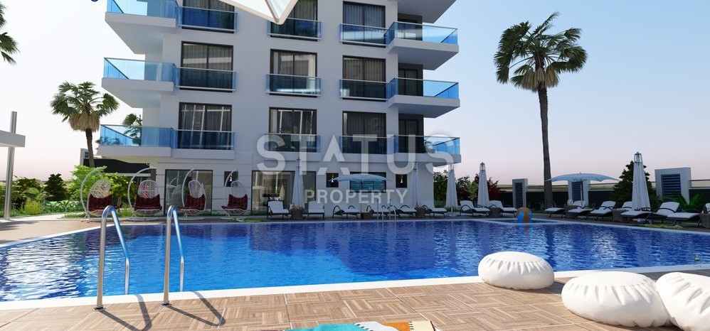 Квартиры 2+1 в новом комплексе на первой береговой линии в Махмутларе фото 2