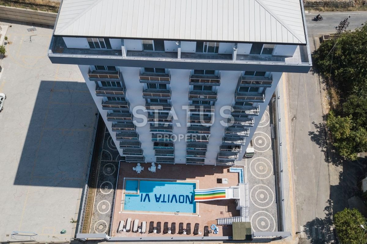 Меблированные апартаменты 1+1 в комплексе с инфраструктурой 47 м2. Махмутлар, Алания. фото 34