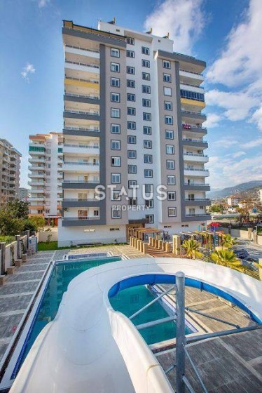 Апартаменты 1+1 недалеко от моря 60 кв.м. Махмутлар, Алания. фото 1