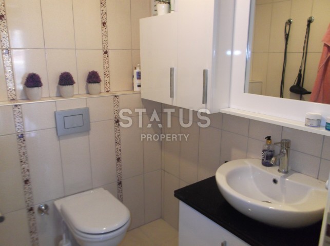 Апартаменты 3+1 в центре Алании с мебелью и техникой в комплексе с бассейном в 600 метрах от пляжа Клеопатры фото 14