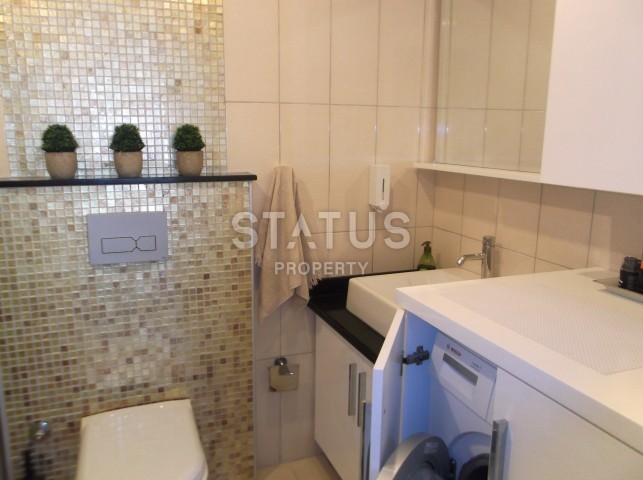 Апартаменты 3+1 в центре Алании с мебелью и техникой в комплексе с бассейном в 600 метрах от пляжа Клеопатры фото 16