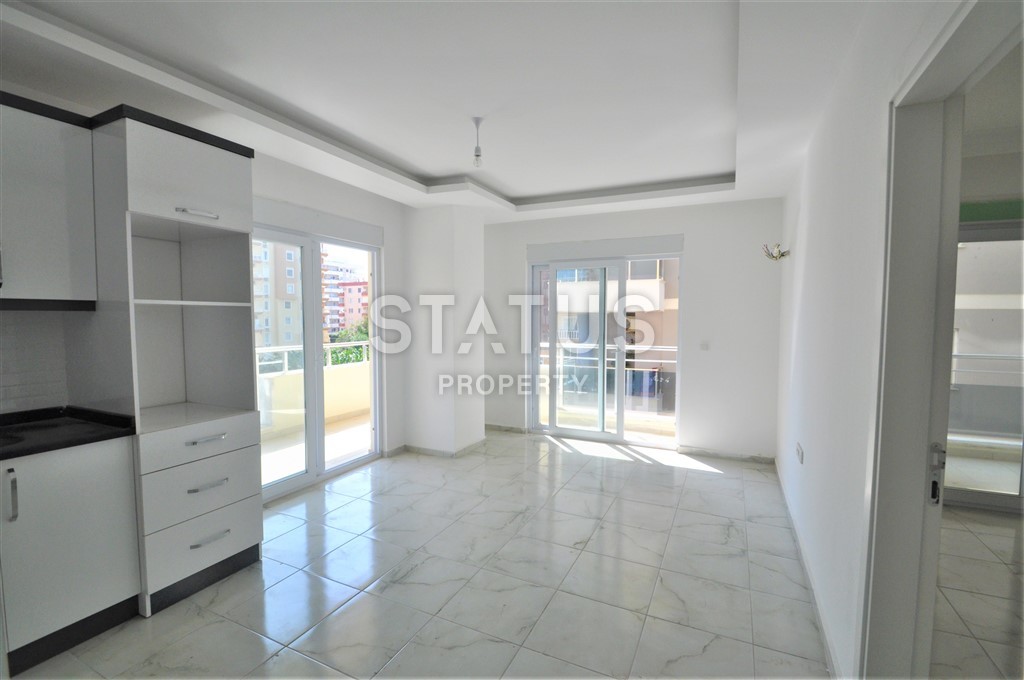 Двухкомнатная квартира в районе Махмутлар, 65 м2 фото 11