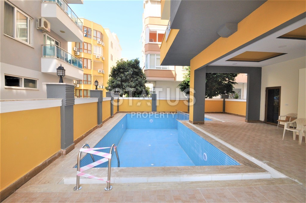 Двухкомнатная квартира в районе Махмутлар, 65 м2 фото 12