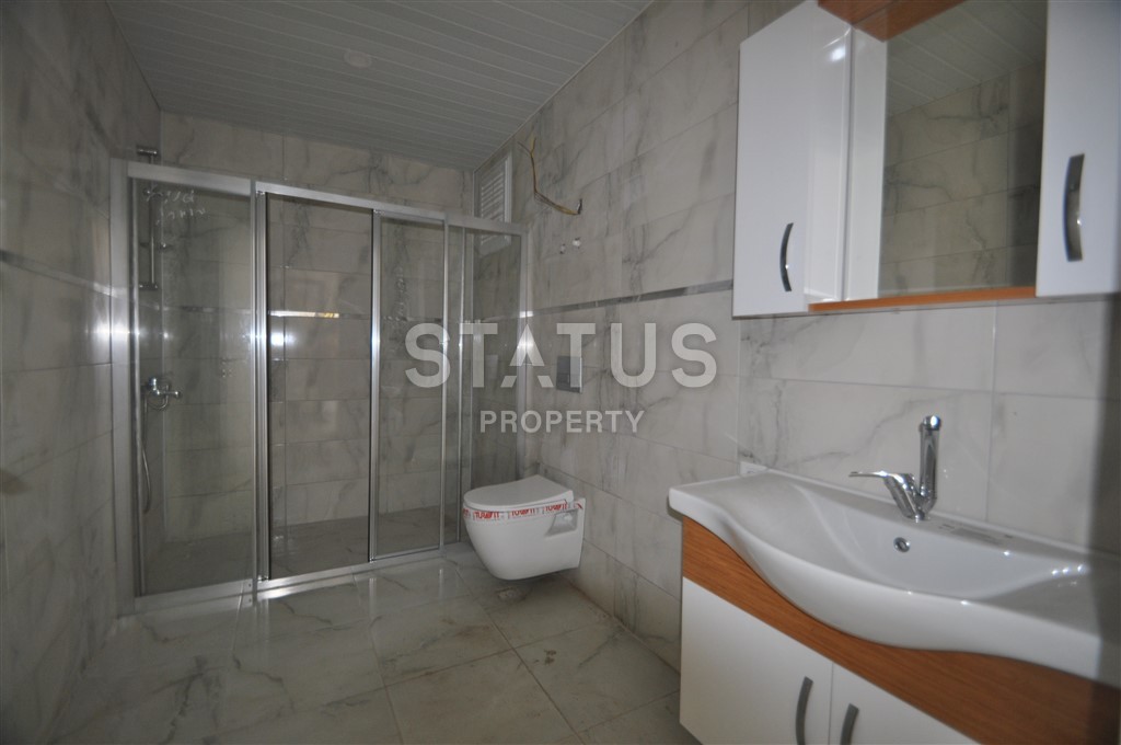 Двухкомнатная квартира в районе Махмутлар, 65 м2 фото 15