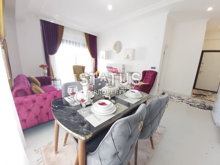 Стильная двухкомнатная квартира в Махмутларе, 65 м2 фото 1